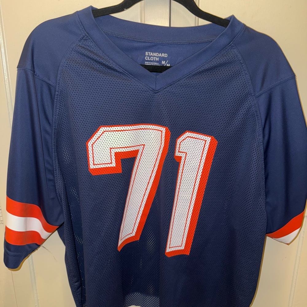 Blue Sports Jersey with Orange and White Number